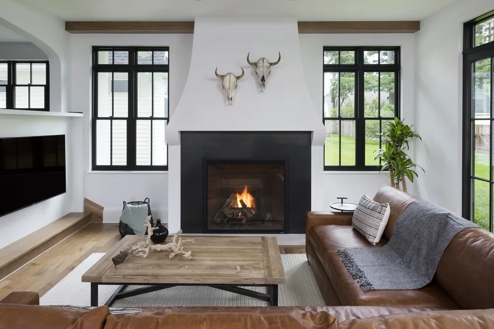 A Heatilator Heirloom wood fireplace in a white living room