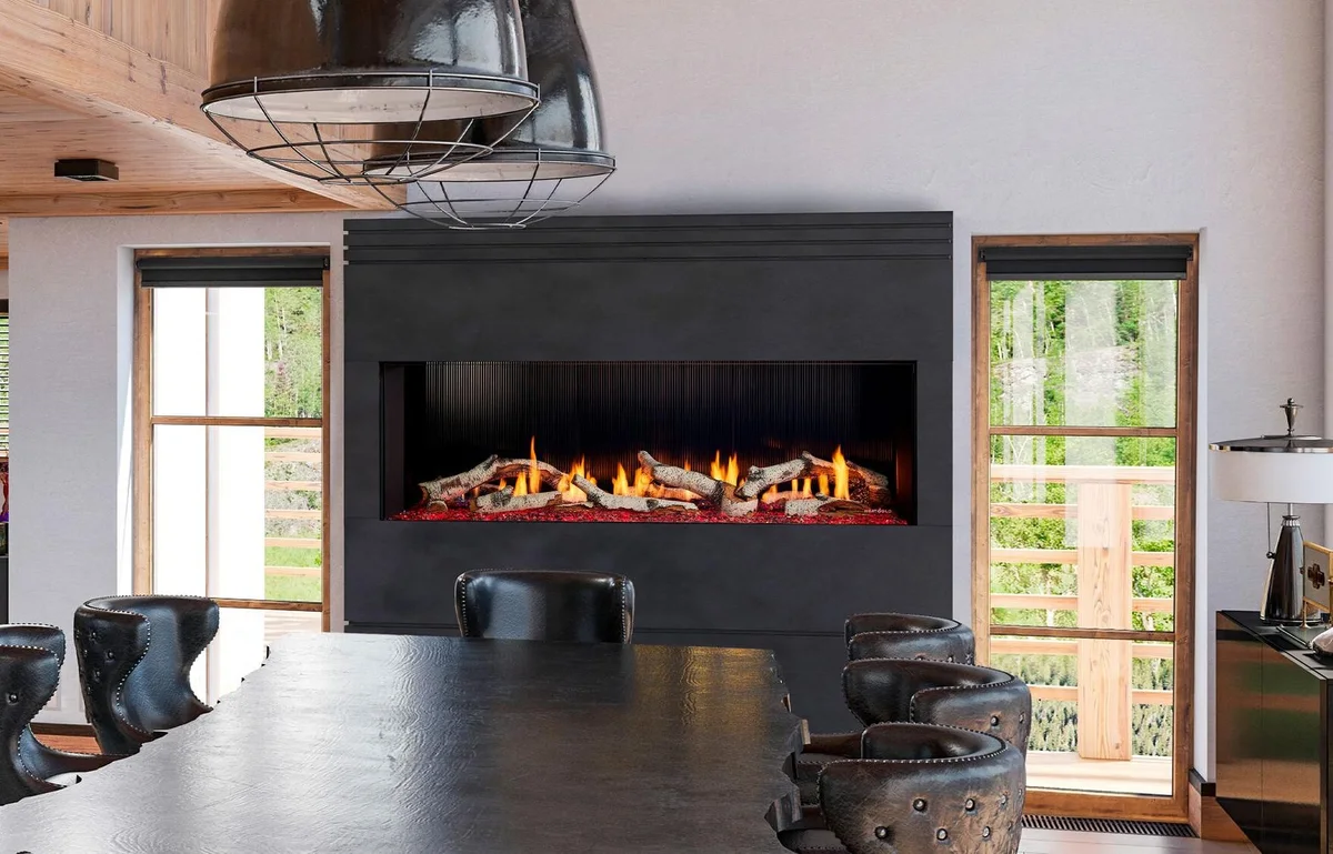 A Heat & Glo Primo II 60 linear gas fireplace in a black wall above a dining table
